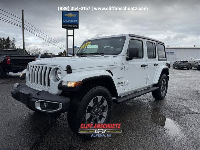 2023 Jeep Wrangler Sahara in Bright White — front three-quarter view