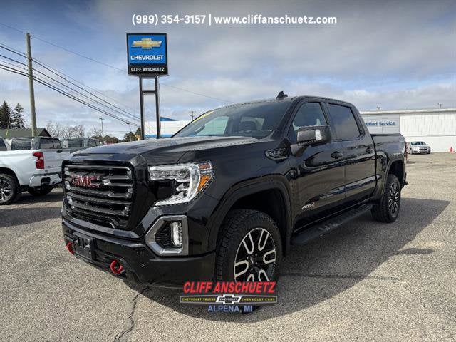 2021 GMC Sierra 1500 AT4 in Onyx Black — front three-quarter view